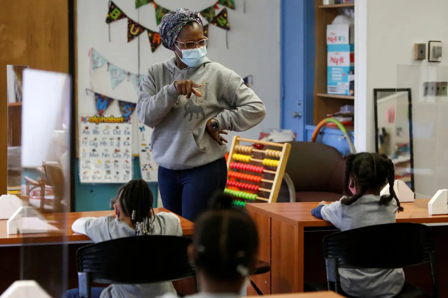 Principal Tamara Hadaway calls on one of her students at Kingsway Preparatory School in the Fifth Ward, known as the historic Black community, in Evanston, Illinois, U.S., March 17, 2021. Hadaway founded the school partly because the Fifth Ward was the only ward in the township without its own elementary school. Picture taken March 17, 2021. REUTERS/Eileen T. Meslar TPX IMAGES OF THE DAY
