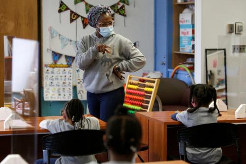 Principal Tamara Hadaway calls on one of her students at Kingsway Preparatory School in the Fifth Ward, known as the historic Black community, in Evanston, Illinois, U.S., March 17, 2021. Hadaway founded the school partly because the Fifth Ward was the only ward in the township without its own elementary school. Picture taken March 17, 2021. REUTERS/Eileen T. Meslar     TPX IMAGES OF THE DAY