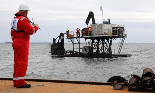 Between the islands of Rügen and Hiddensee, the submarine cable cutter "Nessie II" is being used to lay empty pipes for the broadband connection of Hiddensee 1.80 to 3.50 deep into the seabed; a worker follows the action from an escort vessel. The tracked vehicle is traveling at depths of between 1.50 and 4.20 meters. Nessie II" needs three working days for the two-kilometer-long connection. On February 28, 2022, the fiber optic cable will be "blown" into the empty pipes.