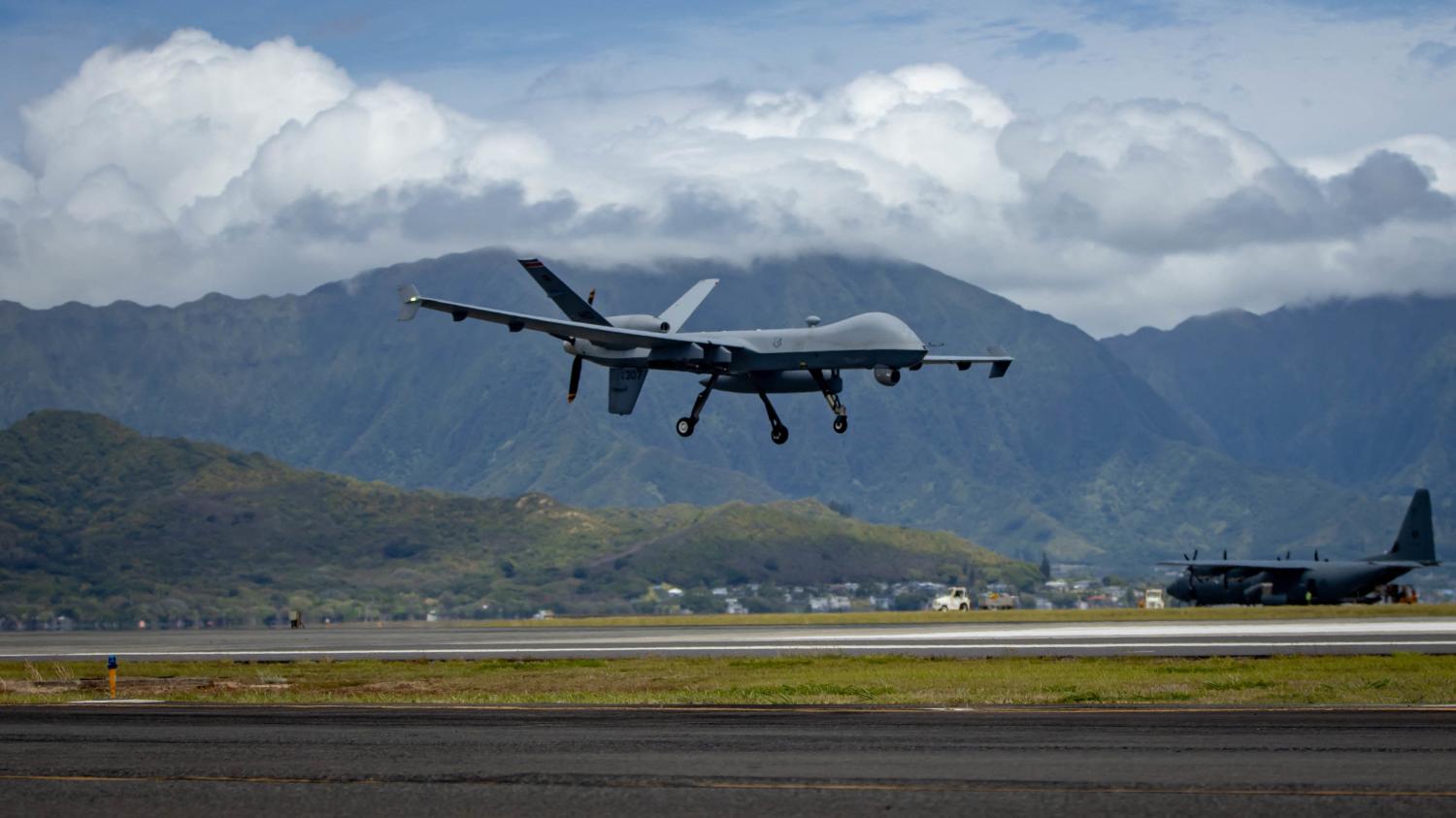 Handout photo dated July 6, 2022 shows a U.S. Air Force MQ-9 Reaper, assigned to the 49th Wing, lands at Marine Corps Air Station Kaneohe Bay, Hawaii, during Rim of the Pacific (RIMPAC) 2022. A Russian fighter jet forced down a US Air Force drone over the Black Sea on Tuesday after damaging the propeller of the American MQ-9 Reaper drone, according to the US Air Force. The Reaper drone and two SU-27 Flanker jets were operating over international waters over the Black Sea when one of the Russian jets intentionally flew in front of and dumped fuel in front of the unmanned drone, according to the official. One of the jets then damaged the propeller of the Reaper, which is mounted on the rear of the drone, the official said. The damage to the propeller forced the US to bring down the Reaper in international waters in the Black Sea. U.S. Marine Corps photo by Lance Cpl. Haley Fourmet Gustavsen via ABACAPRESS.COM