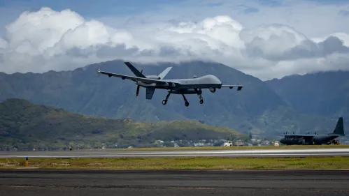 Handout photo dated July 6, 2022 shows a U.S. Air Force MQ-9 Reaper, assigned to the 49th Wing, lands at Marine Corps Air Station Kaneohe Bay, Hawaii, during Rim of the Pacific (RIMPAC) 2022. A Russian fighter jet forced down a US Air Force drone over the Black Sea on Tuesday after damaging the propeller of the American MQ-9 Reaper drone, according to the US Air Force. The Reaper drone and two SU-27 Flanker jets were operating over international waters over the Black Sea when one of the Russian jets intentionally flew in front of and dumped fuel in front of the unmanned drone, according to the official. One of the jets then damaged the propeller of the Reaper, which is mounted on the rear of the drone, the official said. The damage to the propeller forced the US to bring down the Reaper in international waters in the Black Sea. U.S. Marine Corps photo by Lance Cpl. Haley Fourmet Gustavsen via ABACAPRESS.COM
