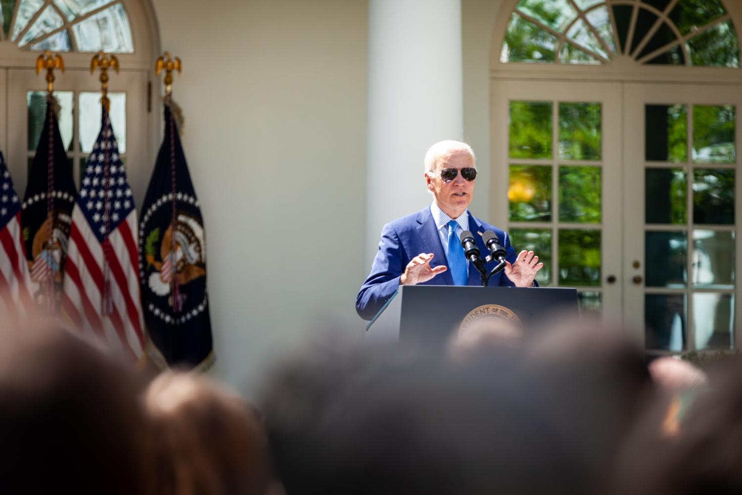 President Joe Biden signs an executive order instituting new government-wide environmental justice measures to build thriving communities during an event in the White House Rose Garden.  He used the event to compare his efforts to promote clean energy, jobs, and removal of harmful materials from the environment with House Republicans’ plans to reduce regulations on use and disposal of fossil fuels and toxic chemicals. (Photo by Allison Bailey/NurPhoto)NO USE FRANCE