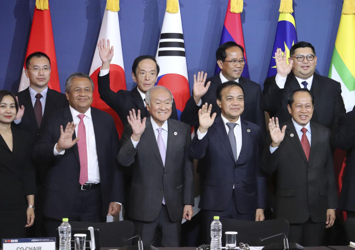 Japan's Finance Minister Shunichi Suzuki (front, C) poses for a photo along with finance chiefs from the Association of Southeast Asian Nations plus Japan, China and South Korea during their meeting in Incheon, South Korea, on May, 2, 2023. (Kyodo)==KyodoNO USE JAPAN