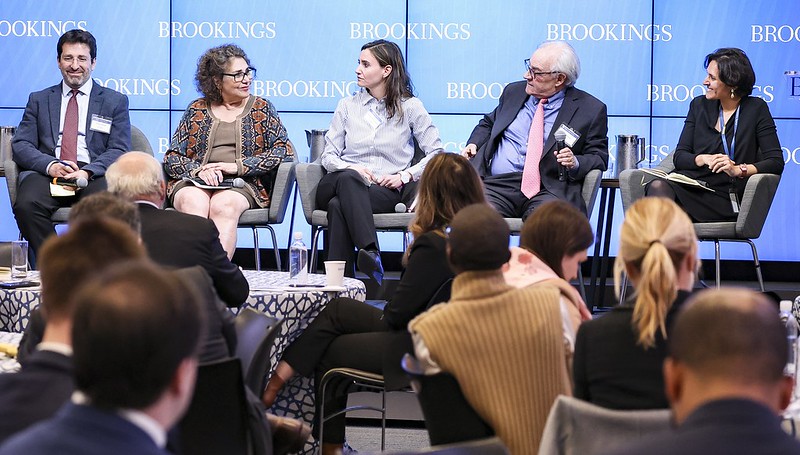 Panelists speak at a Brookings event