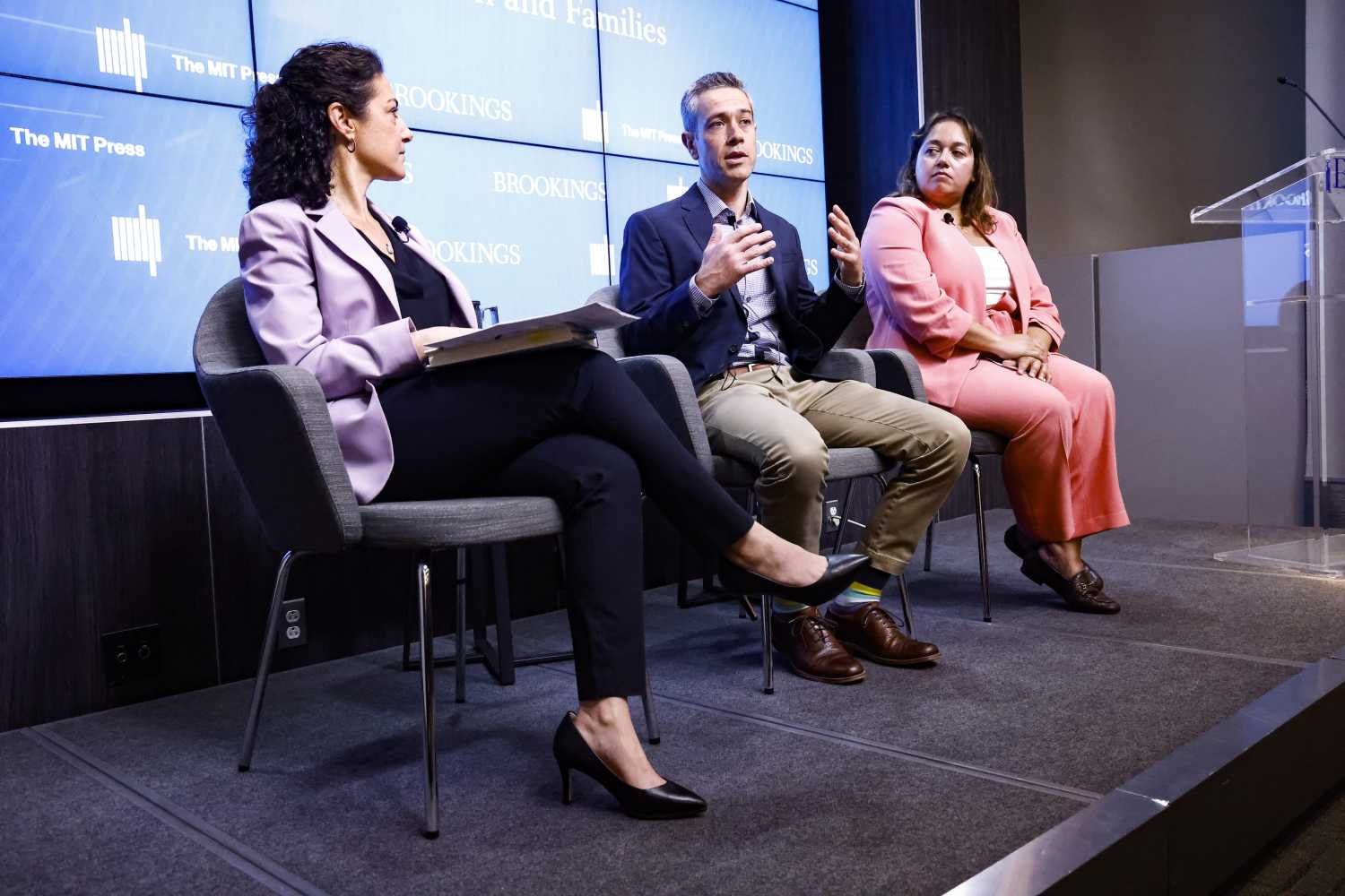 photo of moderator Melissa Kearney, and panelists Nate Hilger and Sharita Gruberg