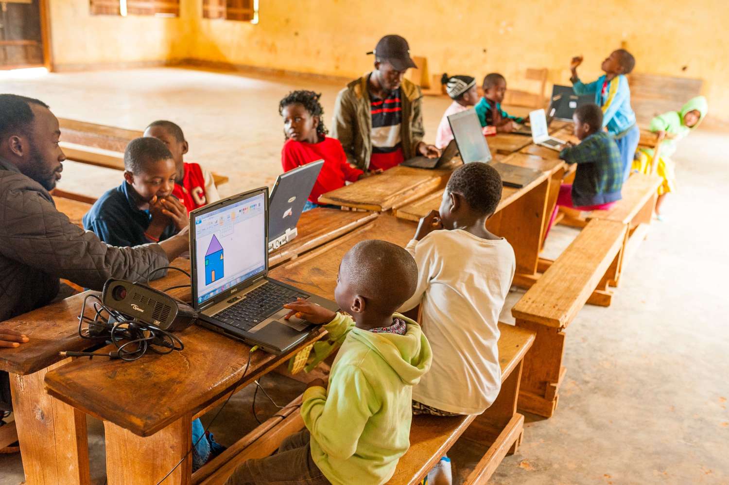 Children in Cameroon study on the computer.