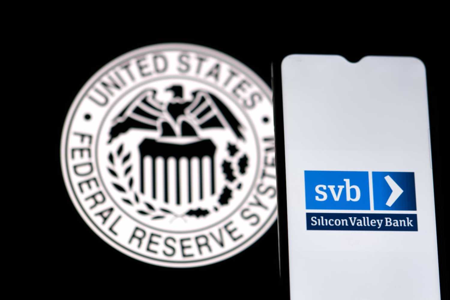 SIlicon Valley Bank in front of Fed logo