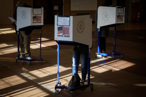 Voters fill out ballots at a polling station during voting for the 2022 midterm elections in Brooklyn, New York, U.S., November 8, 2022. REUTERS/Brendan McDermid