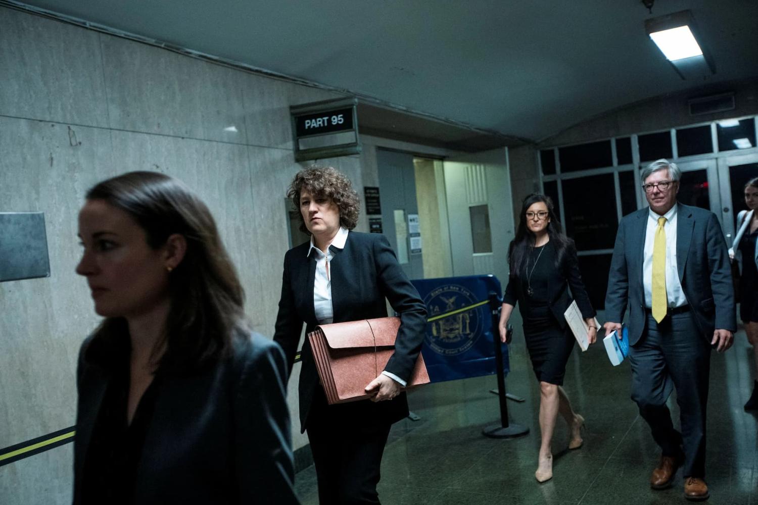 Prosecutor Susan Hoffinger exits the courtroom after attending the hearing regarding the criminal case against former U.S. President Donald Trump over a hush money payment to porn star Stormy Daniels, in Manhattan state court in New York City, U.S., May 23, 2023. REUTERS/Eduardo Munoz