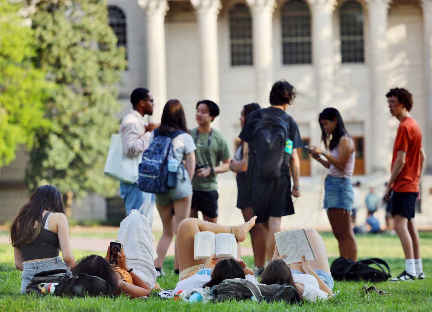 Members of the University of North Carolina?s diverse student body mingle on campus as the Supreme Court weighs the issue of race-conscious admissions to colleges, in Chapel Hill, North Carolina, U.S., April 5, 2023. REUTERS/Jonathan Drake Gathering in support of affirmative action as U.S. Supreme Court hears challenge to race-conscious college admissions
