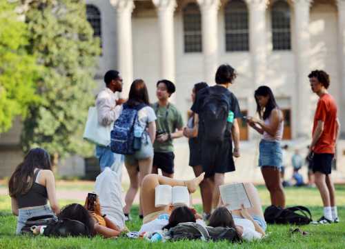 Members of the University of North Carolina?s diverse student body mingle on campus as the Supreme Court weighs the issue of race-conscious admissions to colleges, in Chapel Hill, North Carolina, U.S., April 5, 2023. REUTERS/Jonathan Drake Gathering in support of affirmative action as U.S. Supreme Court hears challenge to race-conscious college admissions