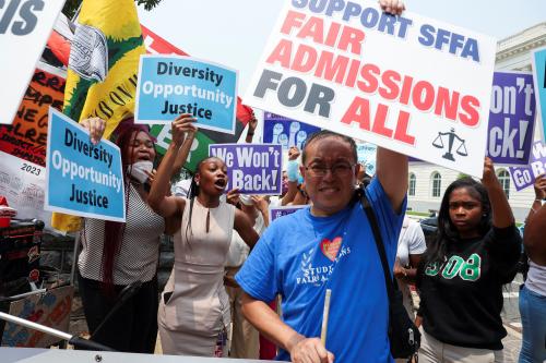 Demonstrators for and against the U.S. Supreme Court decision to strike down race-conscious student admissions programs at Harvard University and the University of North Carolina confront each other, in Washington, U.S., June 29, 2023.