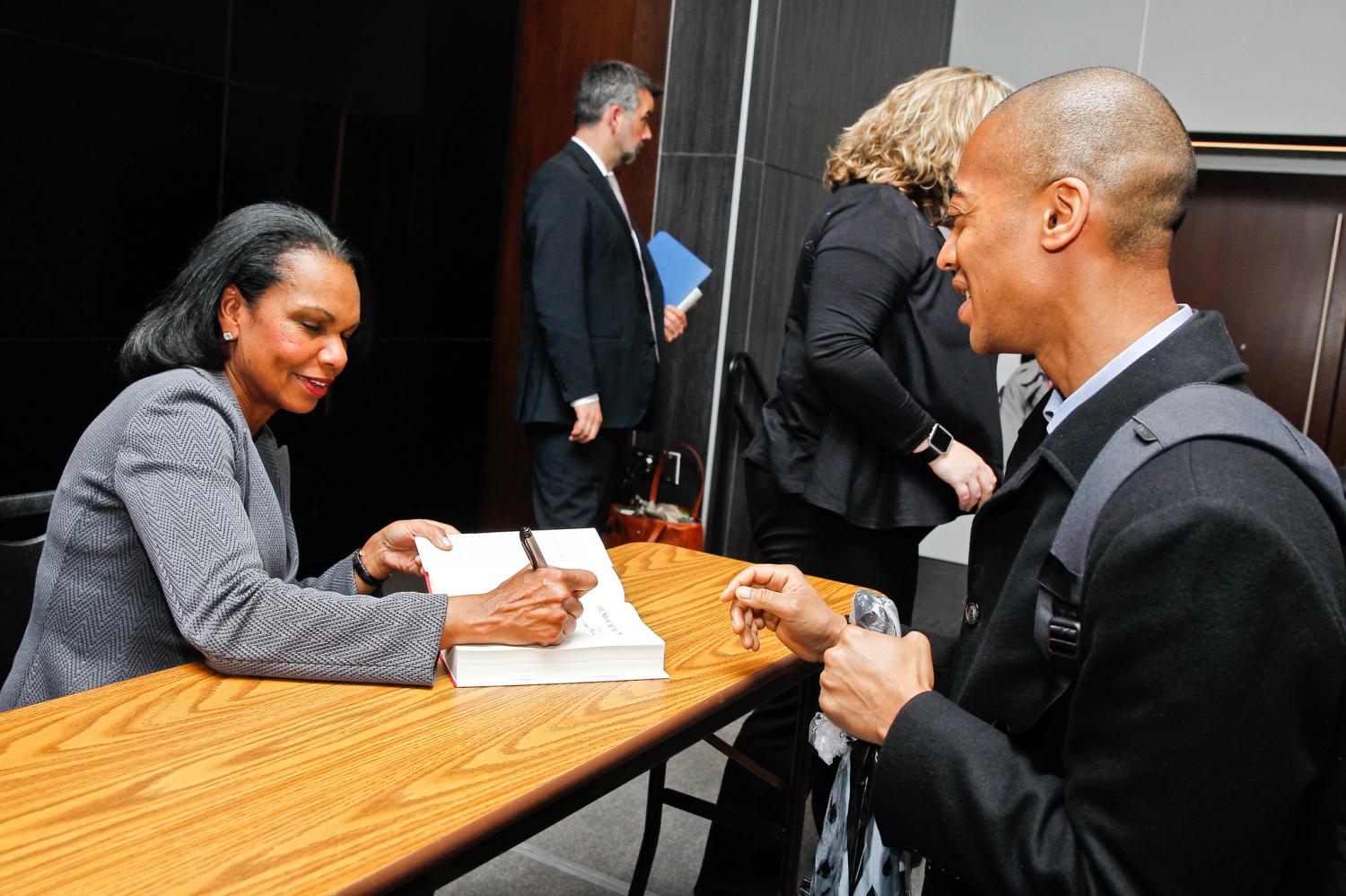 Dr. Condoleezza Rice, former U.S. secretary of state, signs copies of her book, “Democracy: Stories from the Long Road to Freedom,” at a Brookings event.