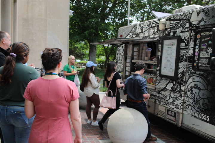 Brookings staff in front of a food truck