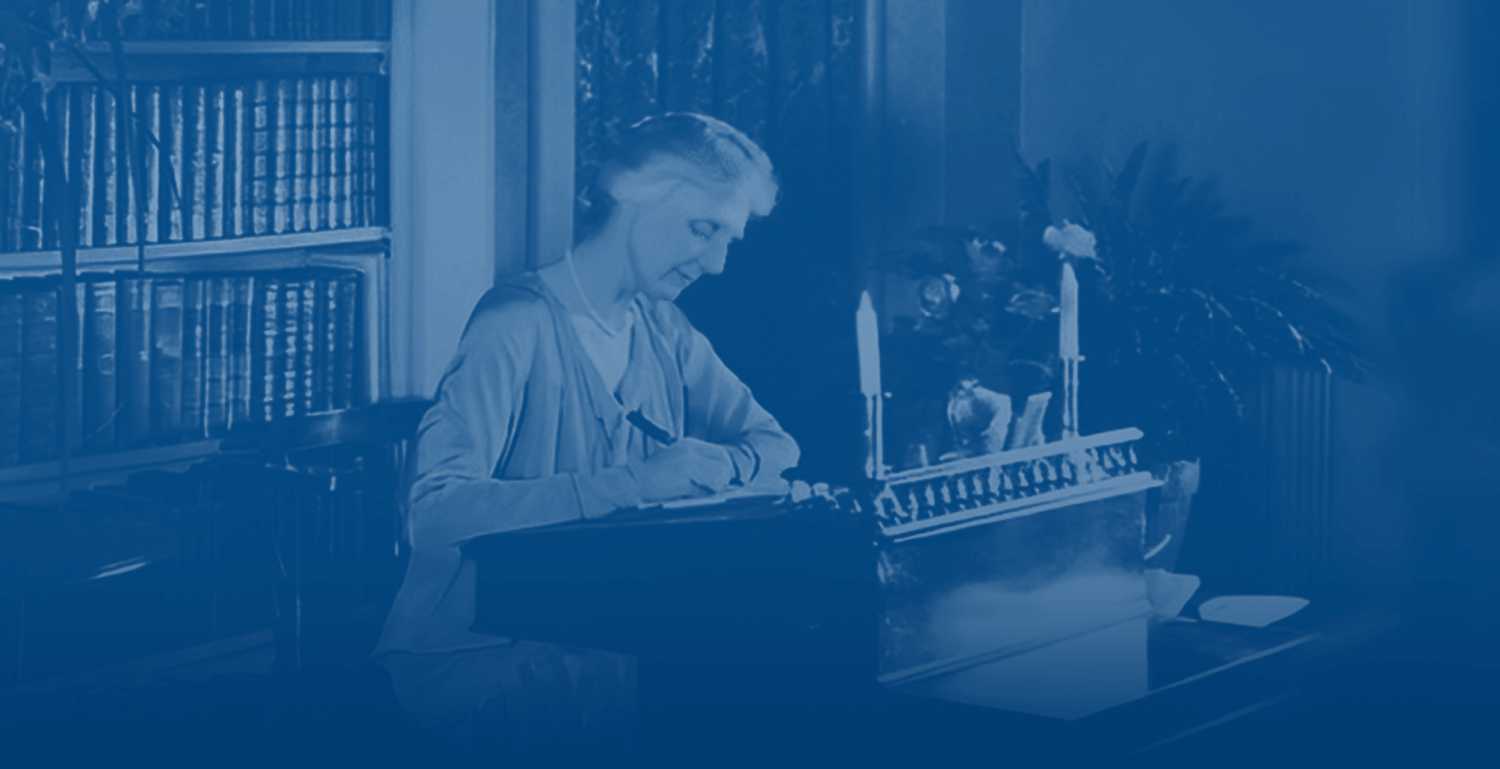 Isabel January at her writing desk