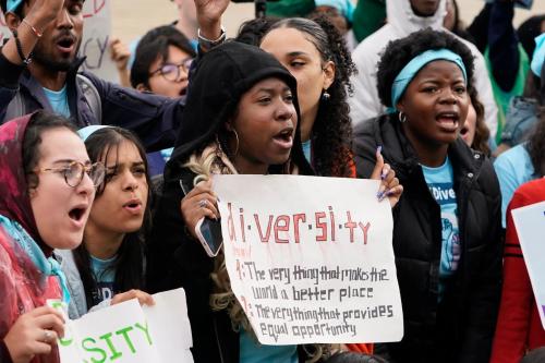 Protestors gather outside as the U.S. Supreme Courts hears oral arguments in two affirmative action college admission cases on October 31, 2022.