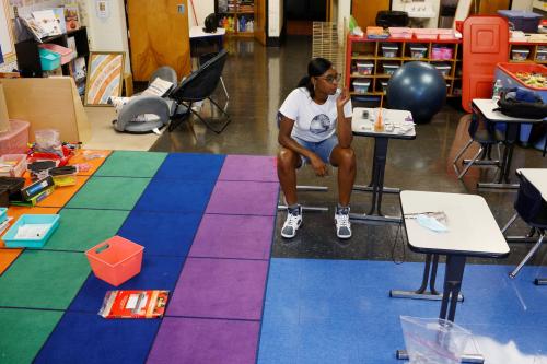 Kindergarten teacher Princess Bryant prepares her classroom for students who will be required to wear masks because of the coronavirus disease (COVID-19) pandemic at the start of the school year, at the Tynan Elementary School in Boston, Massachusetts, U.S., September 7, 2021. REUTERS/Brian Snyder