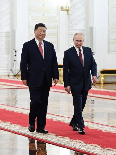 Russian President Vladimir Putin and Chinese President Xi Jinping attend a welcome ceremony before Russia - China talks in narrow format at the Kremlin in Moscow, Russia March 21, 2023. Sputnik/Pavel Byrkin/Kremlin via REUTERS ATTENTION EDITORS - THIS IMAGE WAS PROVIDED BY A THIRD PARTY.