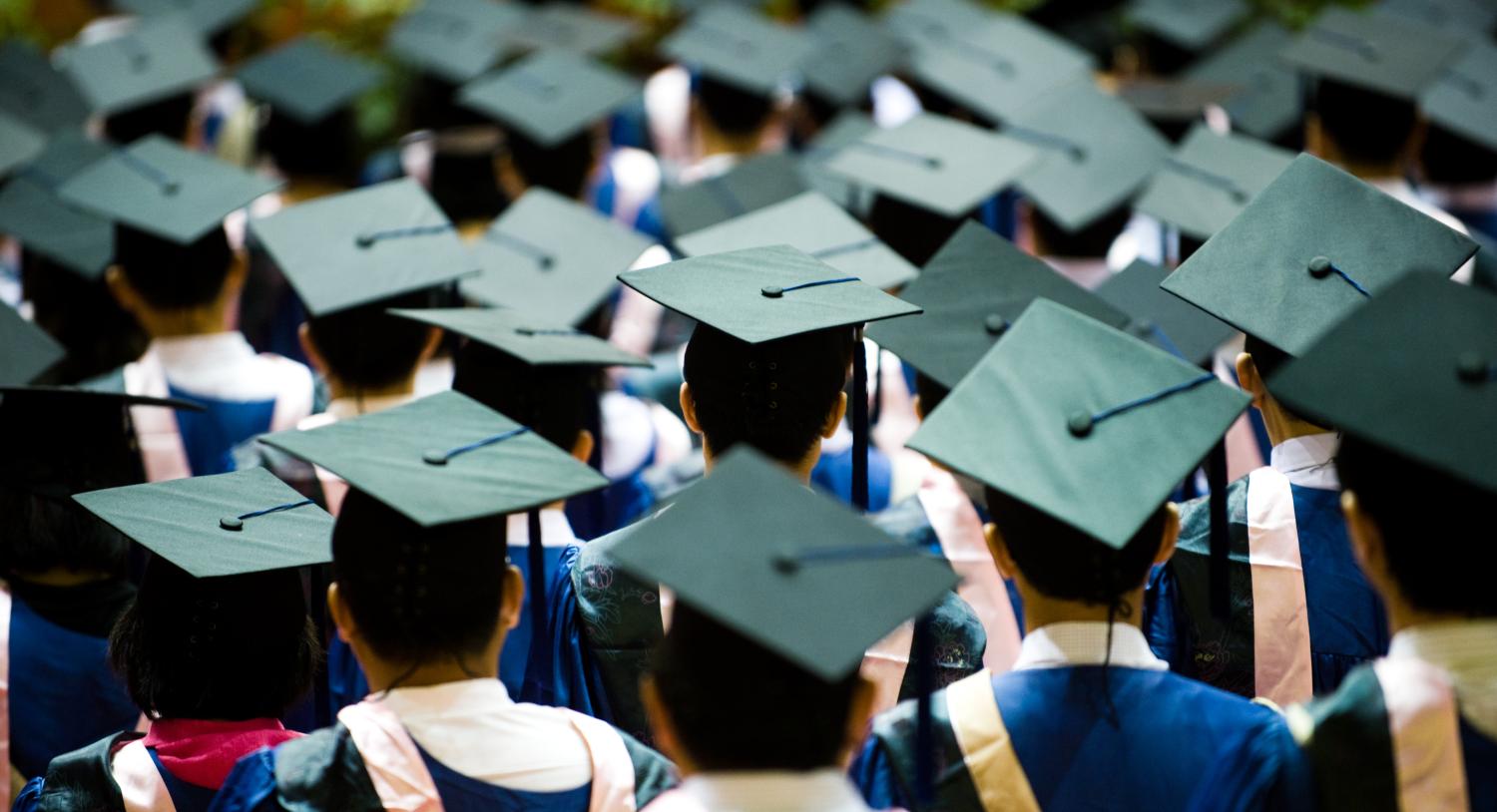 College students in graduation apparel.