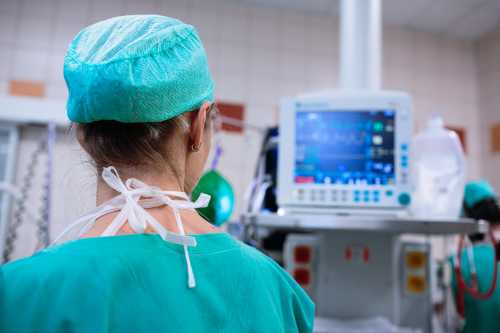 Anesthesiologist in operating room