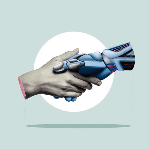 Human hand shaking a mechanical hand