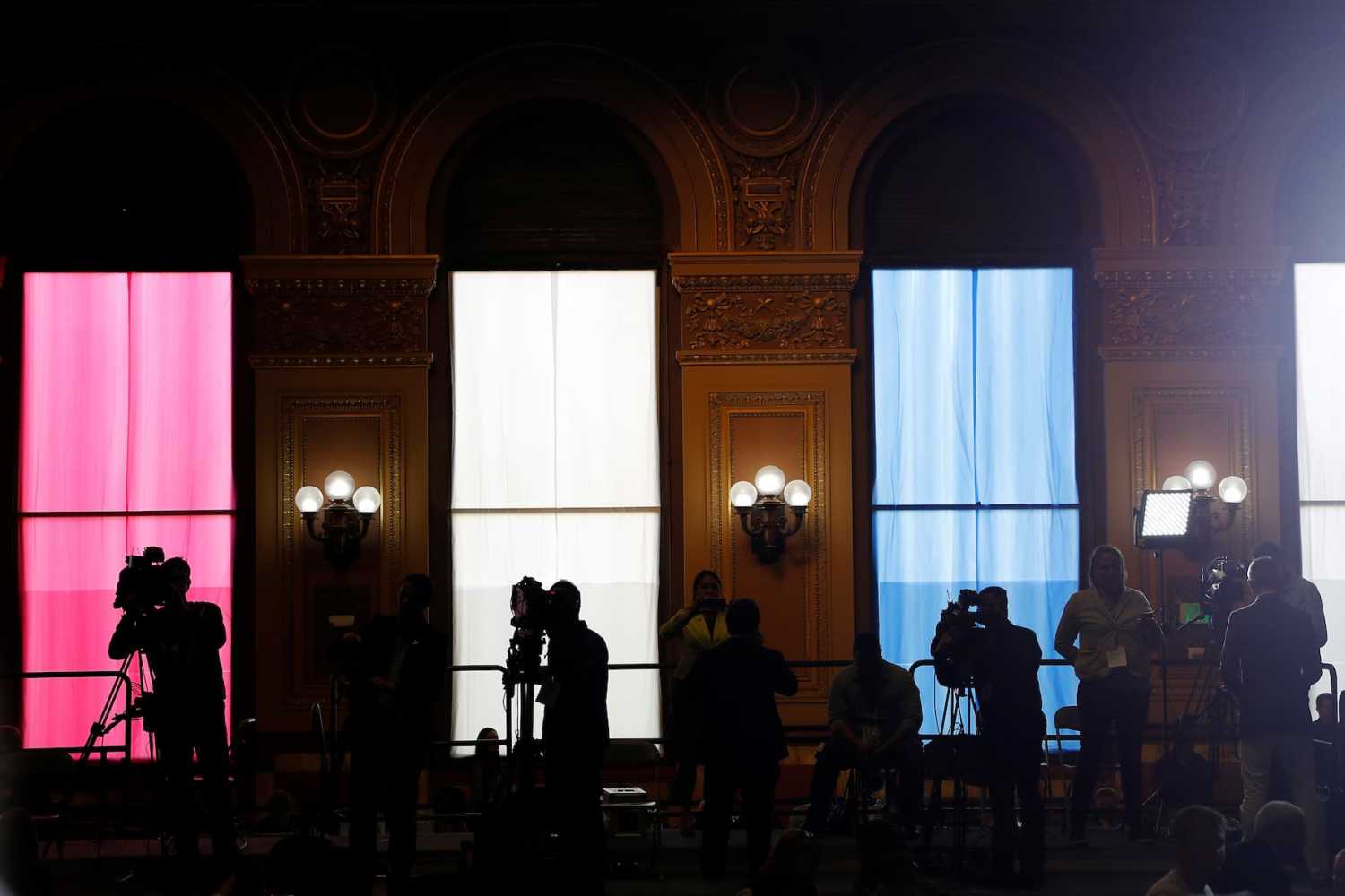 Members of the media stand in position as Democratic U.S. presidential candidate Hillary Clinton speaks at a campaign event in San Francisco, California, U.S. May 26, 2016. REUTERS/Stephen Lam