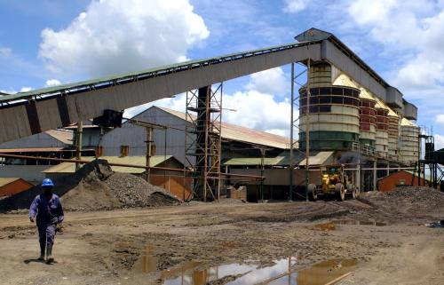 A worker walks near the Congolese state mining company Gecamines' copper concentrator at its Kambove operation in the southern province of Katanga January 31, 2013. REUTERS/Jonny Hogg/File Photo