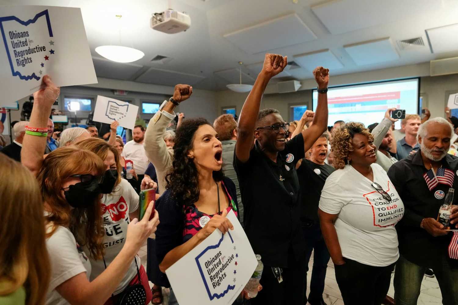 People celebrate the defeat of Issue 1, a Republican-backed measure that would have made it harder to amend the state constitution, an initiative aimed at helping defeat a November referendum that would protect abortion access in the state, after early results were announced during an election night party at the Columbus Fire Fighters Local 67 in Columbus, Ohio, U.S. August 8, 2023. Adam Cairns/USA Today Network via REUTERS.
