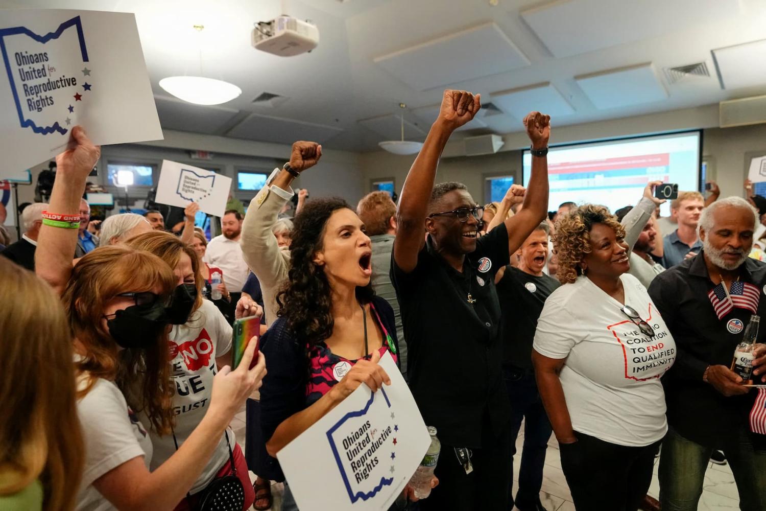 People celebrate the defeat of Issue 1, a Republican-backed measure that would have made it harder to amend the state constitution, an initiative aimed at helping defeat a November referendum that would protect abortion access in the state, after early results were announced during an election night party at the Columbus Fire Fighters Local 67 in Columbus, Ohio, U.S. August 8, 2023. Adam Cairns/USA Today Network via REUTERS.