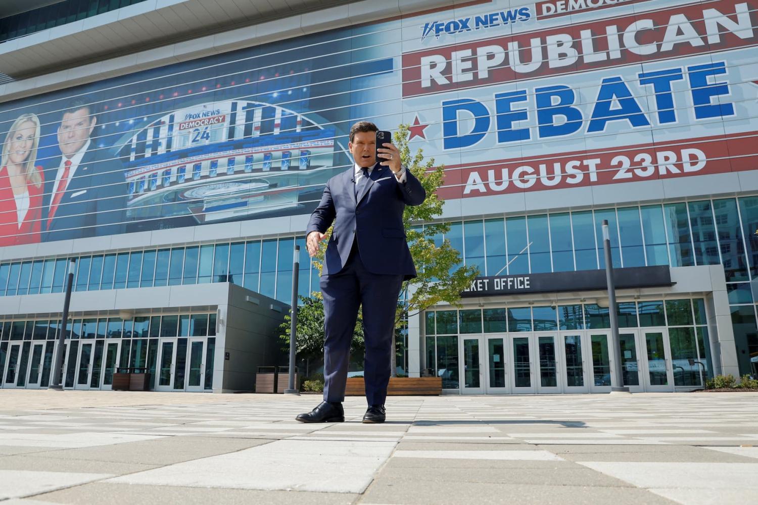 Fox News Host and debate moderator Bret Baier records a social media post outside the arena as preparations are underway for Republican U.S. presidential candidates to gather for their first primary debate of the 2024 campaign in Milwaukee, Wisconsin, U.S. August 22, 2023. REUTERS/Jonathan Ernst