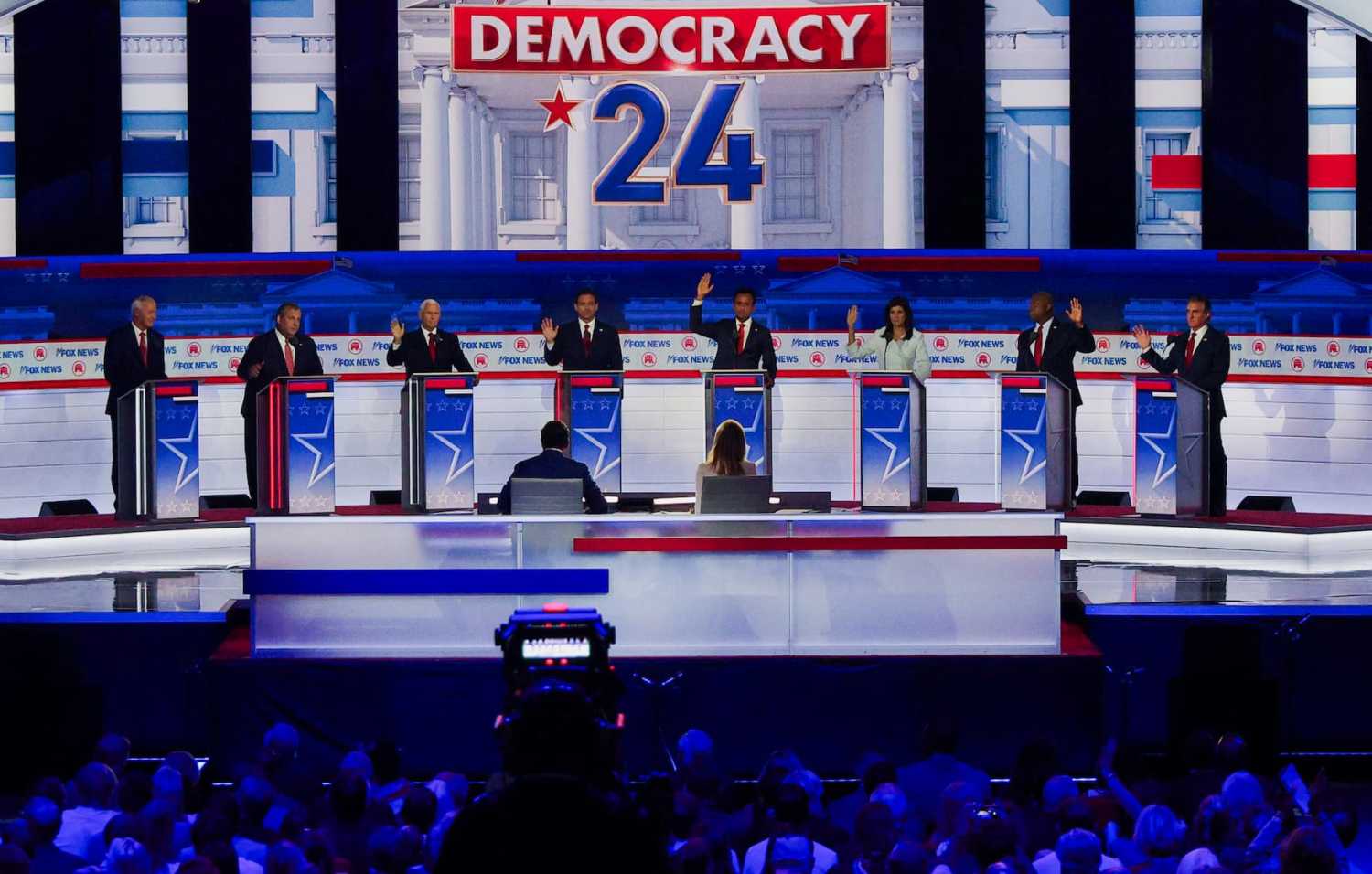 Six of the eight Republican presidential contenders on the debate stage indicate that they would support Donald Trump as their party's 2024 White House nominee even if he is convicted of a crime at the first Republican candidates' debate of the 2024 U.S. presidential campaign in Milwaukee, Wisconsin, U.S. August 23, 2023. Credit: REUTERS/Brian Snyder.