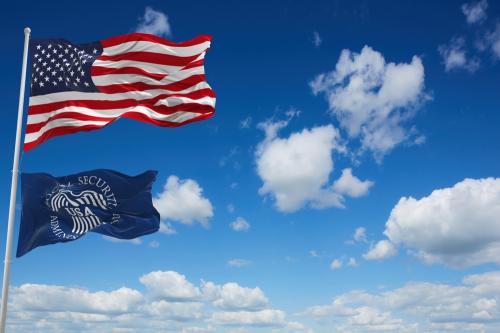 US & Social Security Administration flags