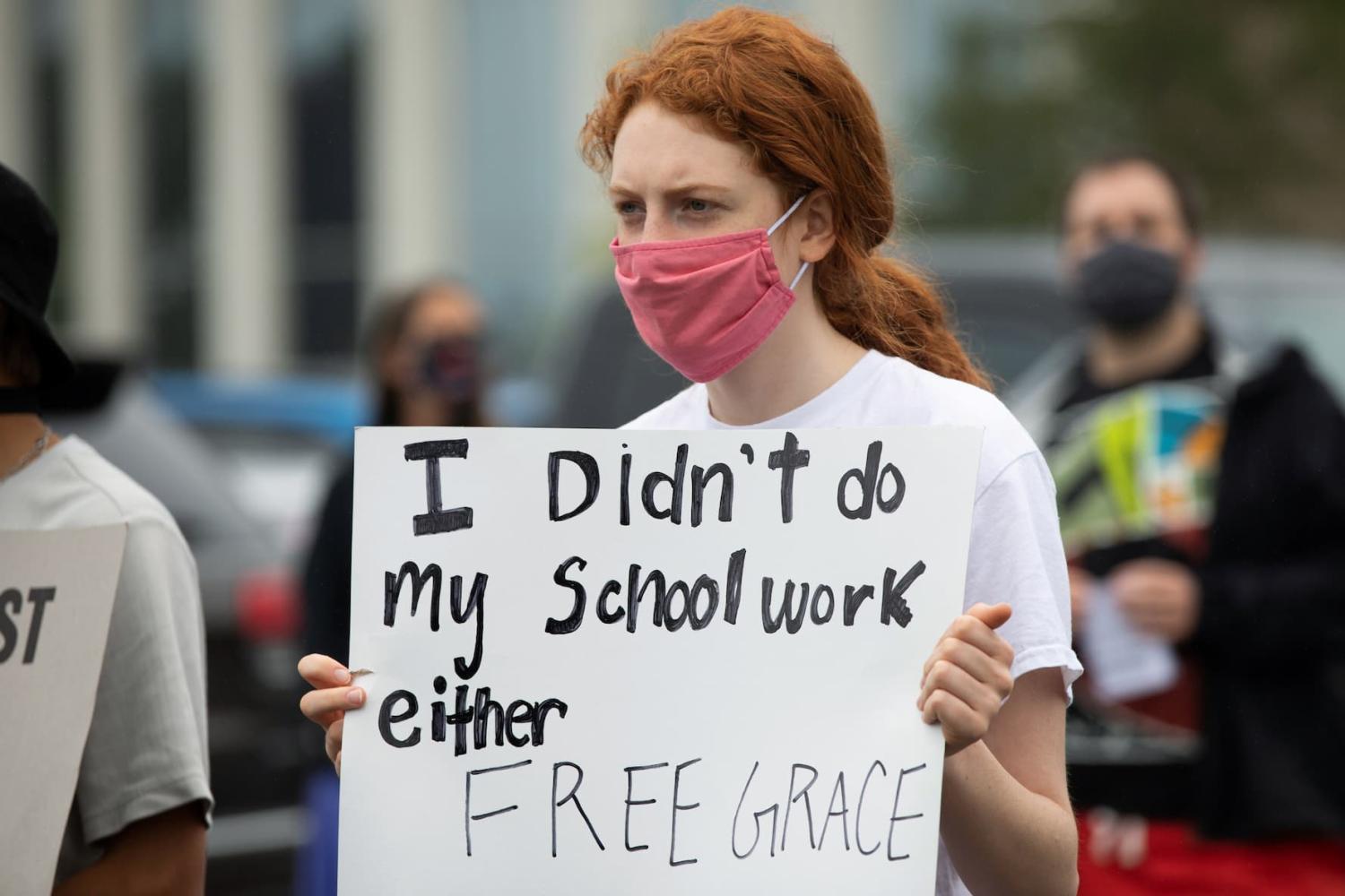Student protests in support of a Black Groves High School student, who was jailed due to a probation violation of not keeping up with her online schoolwork, in front of the Oakland County Circuit Court and Prosecutors Office in the Detroit suburb of Pontiac, Michigan, U.S. July 16, 2020. REUTERS/Emily Elconin