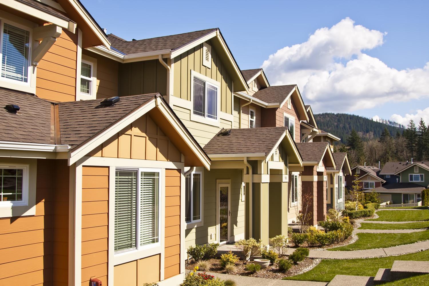 A row of new townhouses or condominiums.