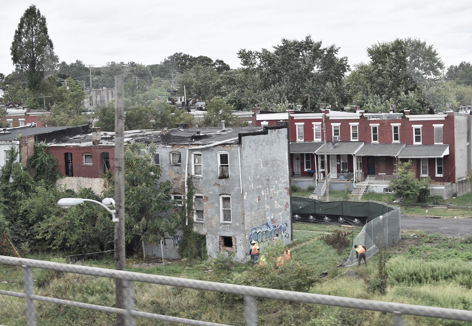 September 2019, Baltimore, Maryland - Suburbs of Baltimore like Cherry Hill as seen from tranm line show the extent of inner city poverty in USA with houses in dire condition