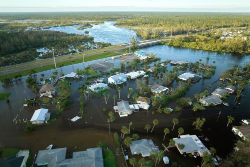 Hurricane Ian flooded houses in Florida residential area. Natural disaster and its consequences