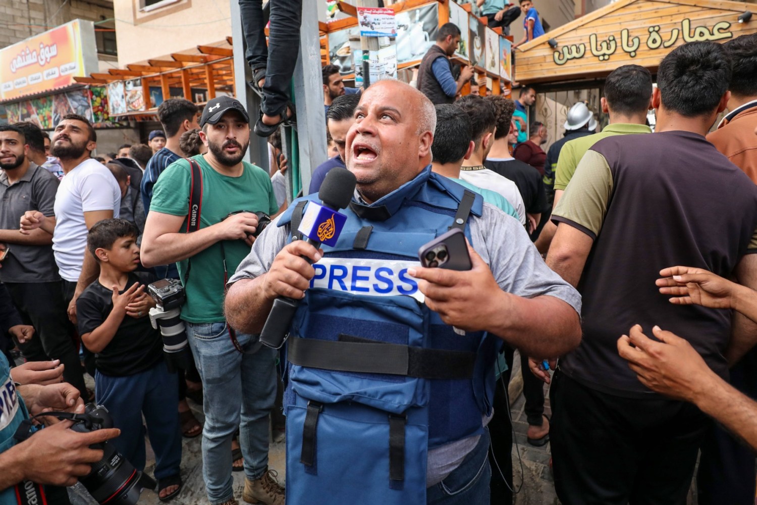 Palestinian journalists cover the conflict between Islamic Jihad movement and Israel in Gaza city in May 2023.
