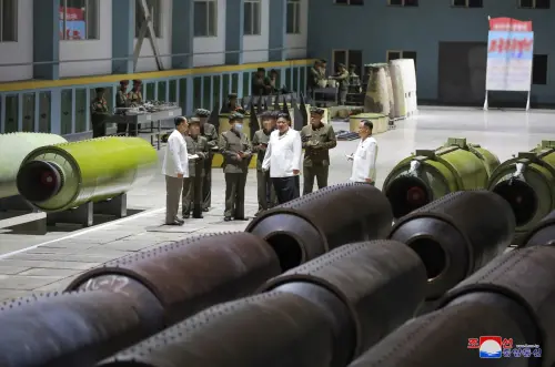 North Korean State Affairs Committee Chairman Kim Jong -un, visiting a munitions factory in Pyongyang.