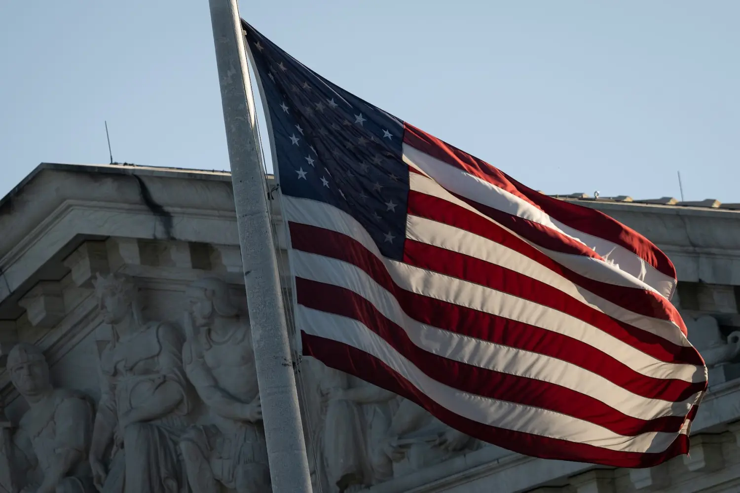 An American flag flies in front of the U.S. Supreme Court Building, in Washington, D.C., on Tuesday, September 19, 2023. (Graeme Sloan/Sipa USA)