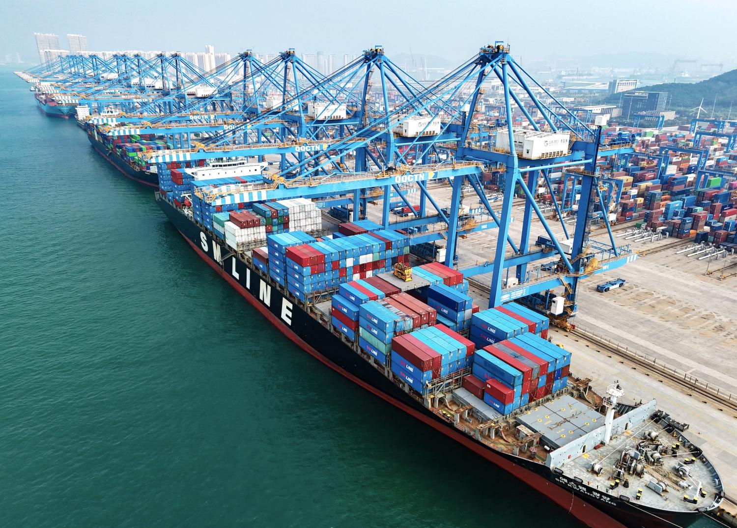 Dozens of freighters dock for loading and unloading at the Qingdao section of the Shandong Pilot Free Trade Zone in Qingdao, Shandong province, China, Sept 27, 2023.