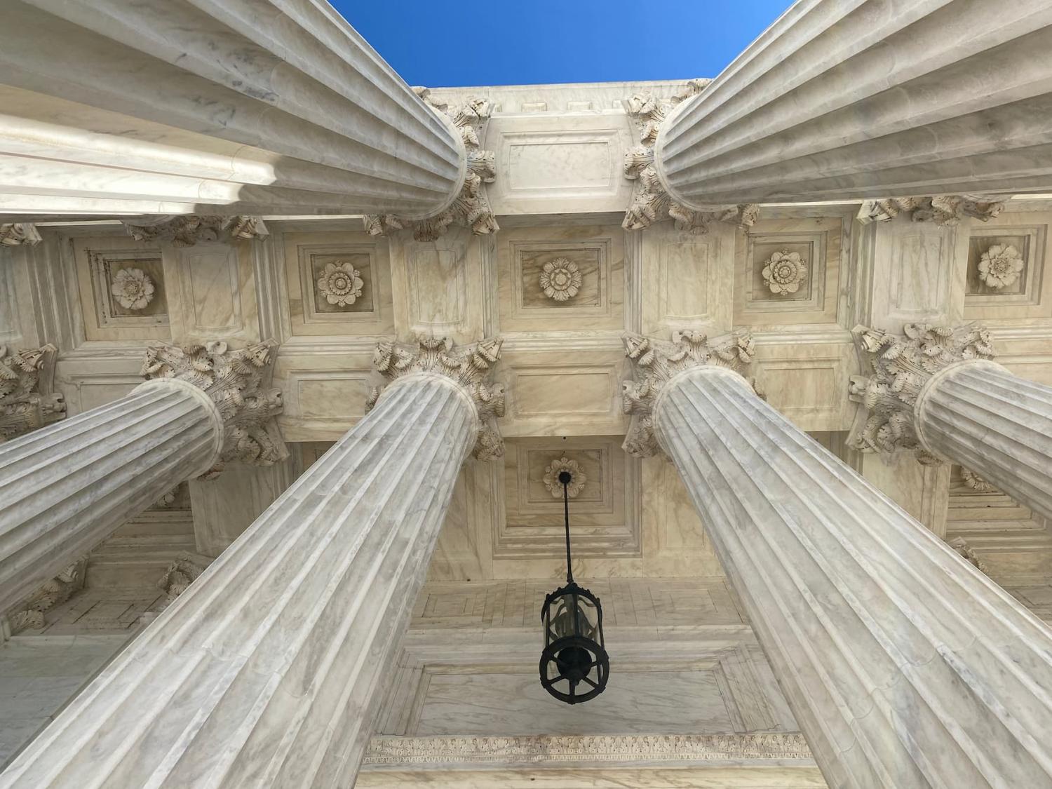 FILE PHOTO: The ceiling of the U.S. Supreme Court building's portico is seen in Washington, U.S., November 26, 2021. REUTERS/Will Dunham/File Photo