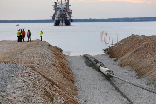 A view of the Balticconector pipeline as it is pulled into the sea in Paldiski, Estonia in an undated handout photo taken in 2019.