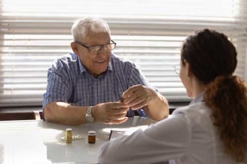 A Medicare and Medicaid patient talks to a doctor