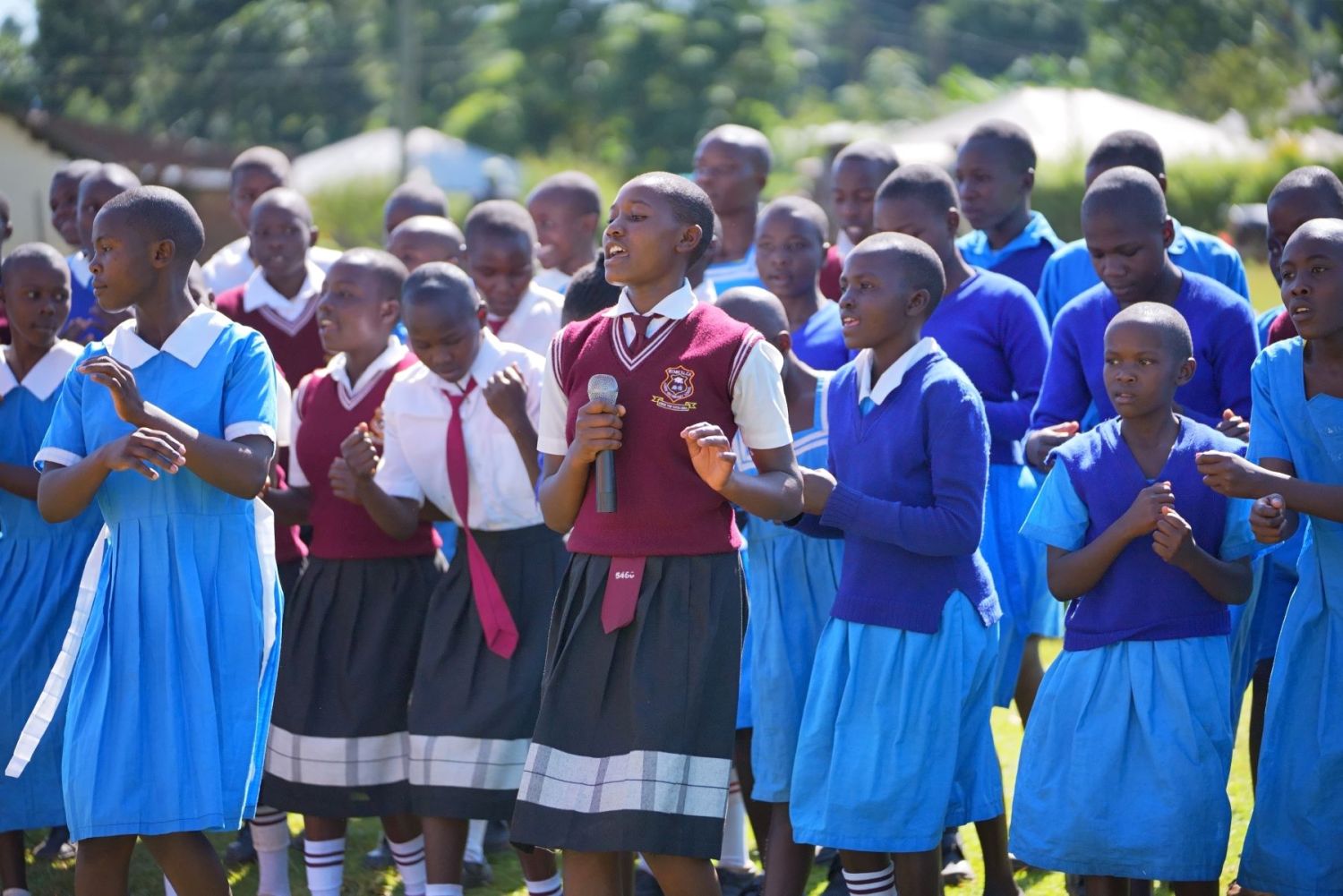 Adolescent girls gather for an event at a school in Kenya