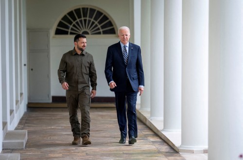 Ukrainian President Volodymyr Zelenskiy walks down the White House colonnade to the Oval Office with U.S. President Joe Biden during a visit to the White House in Washington, U.S., September 21, 2023.