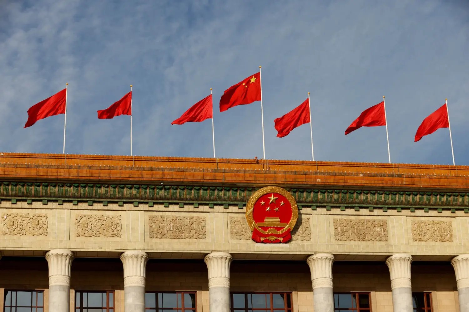 A Chinese flag flutters on top of the Great Hall of the People ahead of the opening ceremony of the Belt and Road Forum, to mark 10th anniversary of the Belt and Road Initiative, in Beijing, China October 18, 2023.