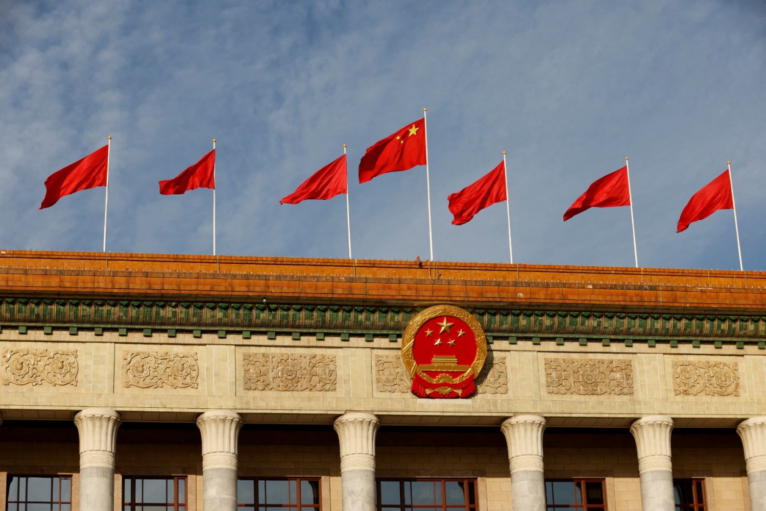 A Chinese flag flutters on top of the Great Hall of the People ahead of the opening ceremony of the Belt and Road Forum, to mark 10th anniversary of the Belt and Road Initiative, in Beijing, China October 18, 2023.