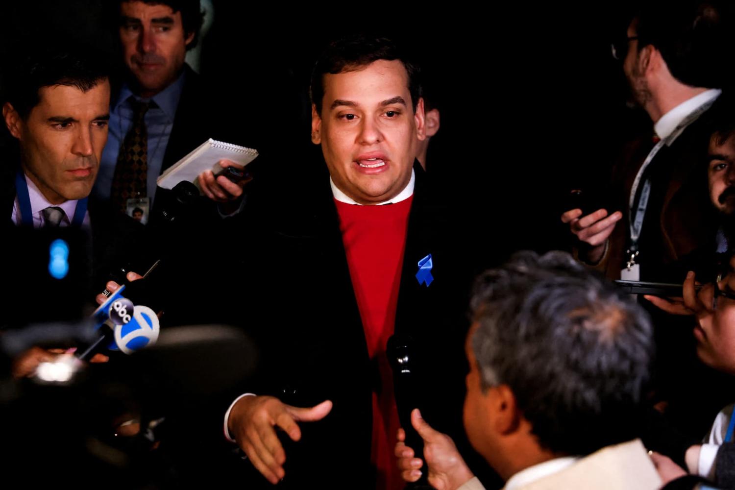 FILE PHOTO: U.S. Rep. George Santos (R-NY) speaks to members of the media after his congressional colleagues voted not to expel him from the House, after he was indicted on 23 federal corruption charges, on Capitol Hill in Washington, U.S. November 1, 2023. Credit: REUTERS/Julia Nikhinson/File Photo/File Photo