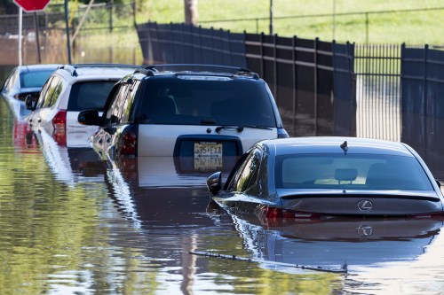 Parked cars submerged underwater in the aftermath of Hurricane Ida. New Brunswick, New Jersey - September 2, 2021