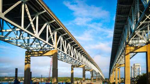 Gold Star Memorial Bridges in New London, Connecticut. Two highway bridges in diminishing perspective, low angle view.
